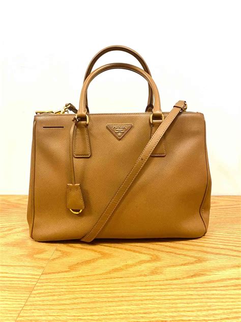 qual a bolsa mais barata da prada|bolsa satchel prada.